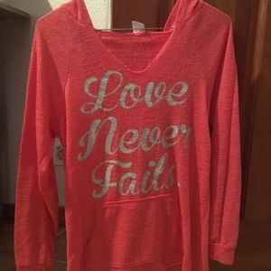 “Love Never Fails” Hoodie